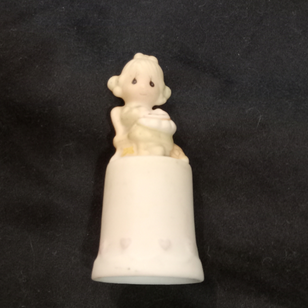 Precious Moments Cream and Gold Figurine